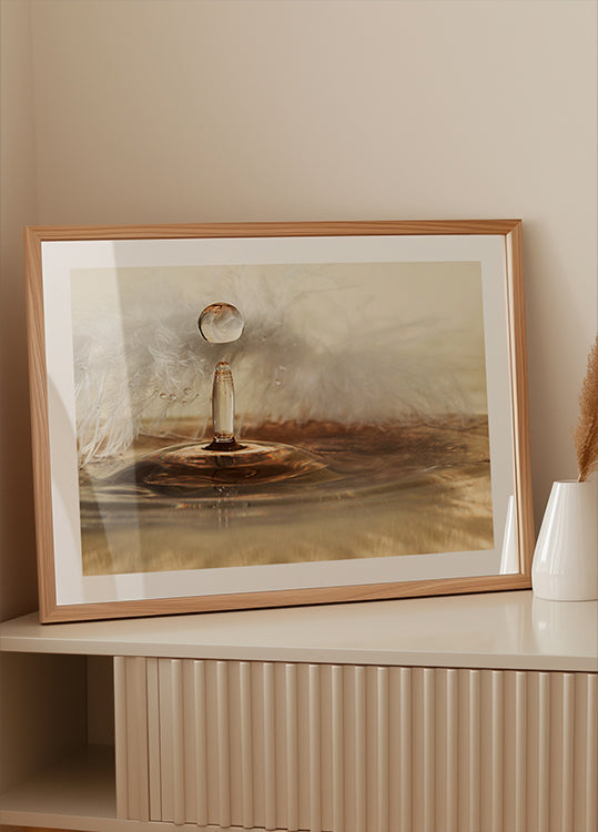 Kultaiset höyhenpisarat