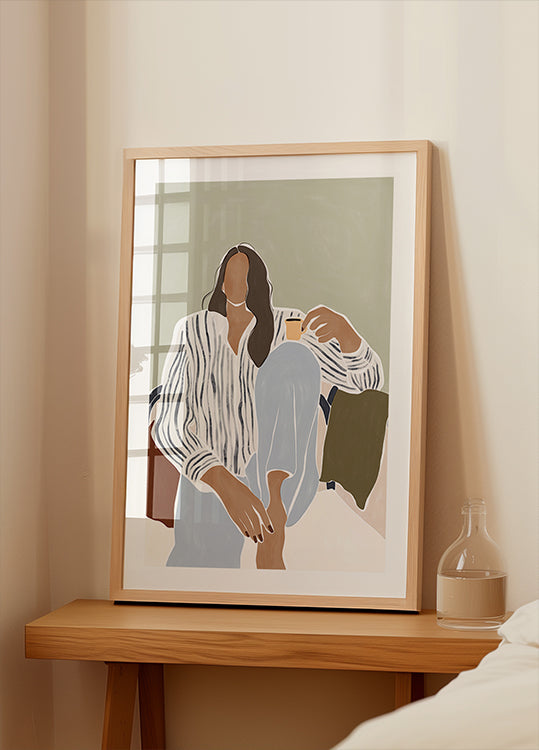 Nainen nauttimassa kupillista espressojulistetta