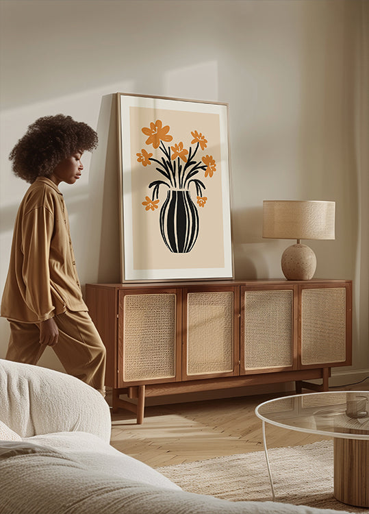 Oranssi maljakkokukkien juliste